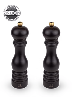 The very trendy glossy black lacquer on the rounded shape of the iconic Paris Mill Set, 22cm, turns this beautiful pair into artefact for the table. This wood salt and pepper mill set is turned, painted and assembled in France, at the Peugeot Manufacture. Paris