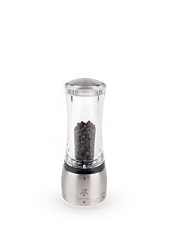 The Peugeot Daman pepper mill perfectly combines usefulness and beauty. This manual pepper mill, 21 cm tall, is fitted with a reservoir with a magnetic cover to make filling easier. Daman