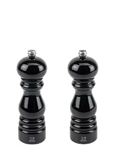 These black and white lacquered Paris mills are made in France from beechwood. This pepper and salt mill duo is equipped with Peugeot mechanisms, renowned for their performance and backed by a lifetime guarantee. Duo Paris
