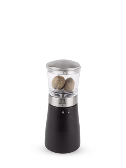 Peugeot A striking combination of chocolate wood, stainless steel, and acrylic gives this nutmeg mill a standout appearance as well as a practical mechanism for fine grating with no risk to your fingers. Madras